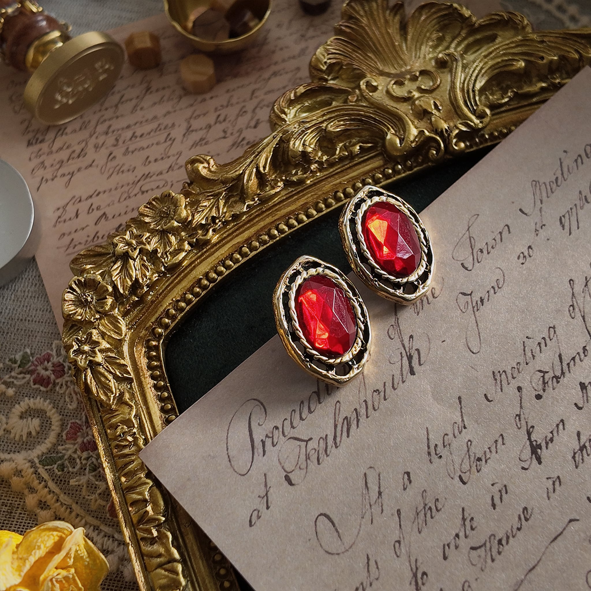Vintage-style gemstone jewelry, court-style stud earrings. Extravagant medieval jewelry.