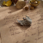 Silver rhinestone brooch, a small pin. Animal design, vintage style.