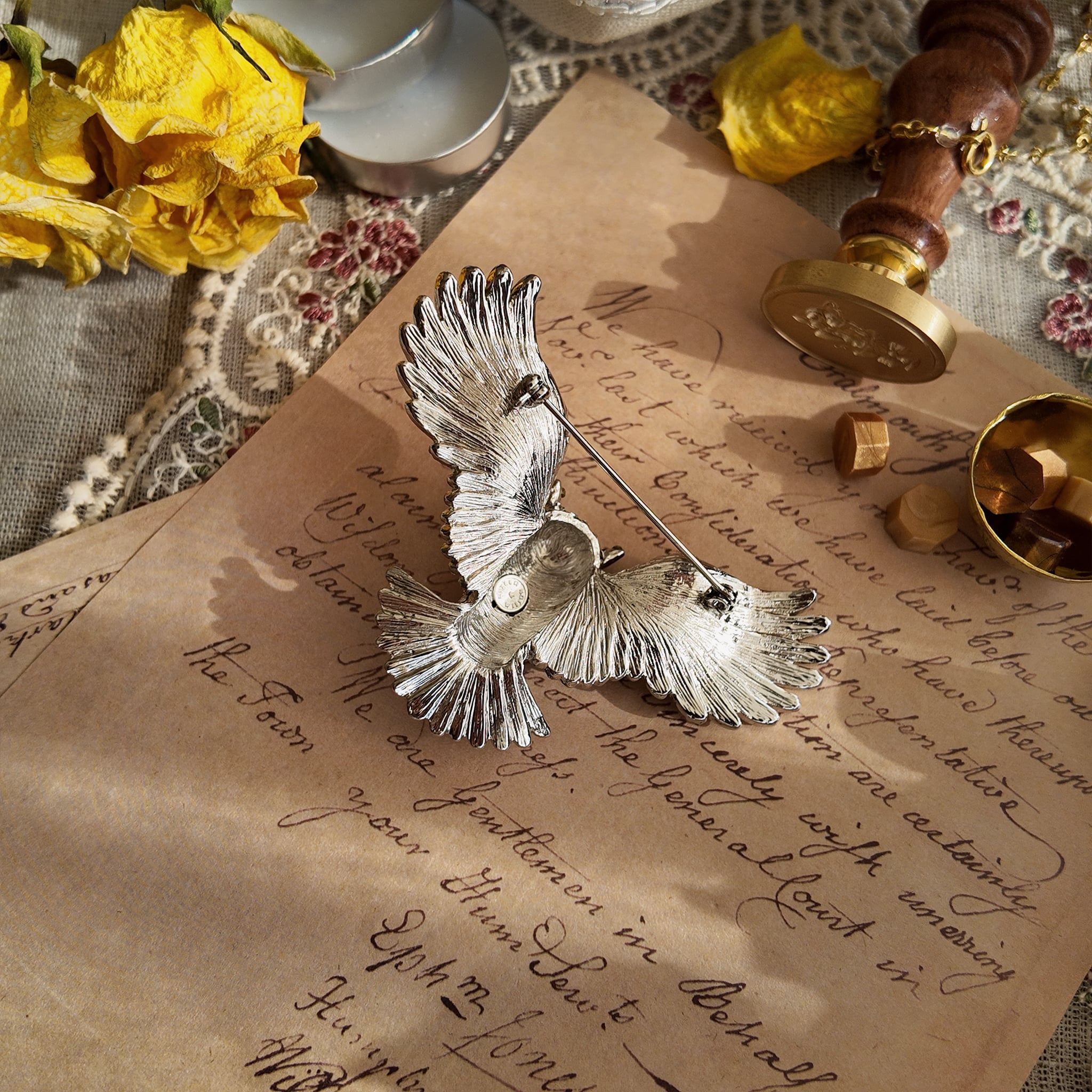 Bird-themed jewelry, owl brooch. Vintage silver jewelry, owl design.