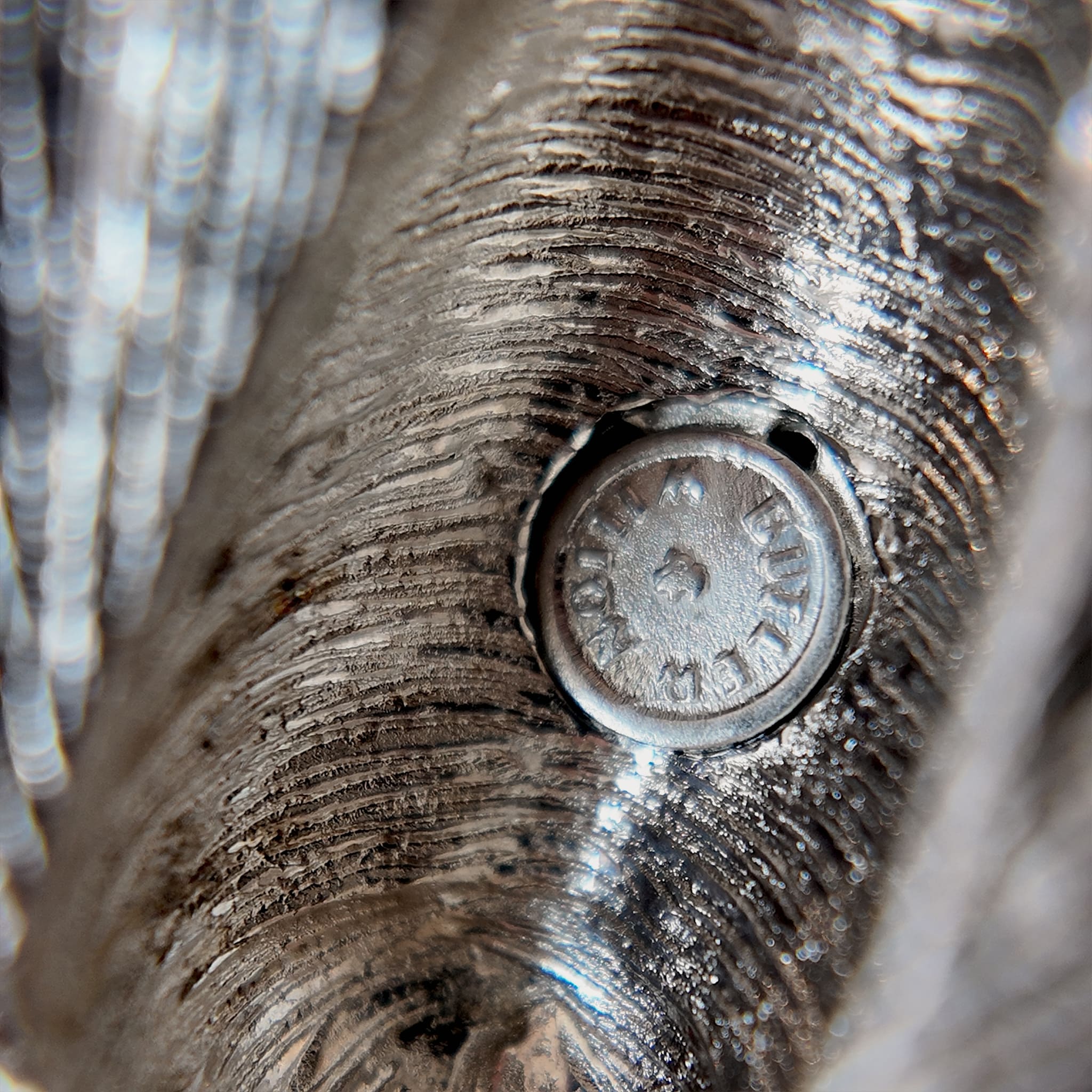 The Butler & Wilson brand stamp is a symbol of official authenticity for their jewelry.