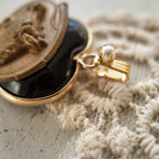 Vintage pendant, black heart-shaped glass, gold-plated clasp. Sweet and lovely, vintage jewelry.