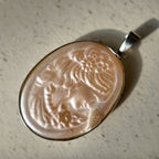 Mother-of-pearl carved Cameo figure pendant. Pearl carved jewelry, profile of a young girl, Cameo figure.