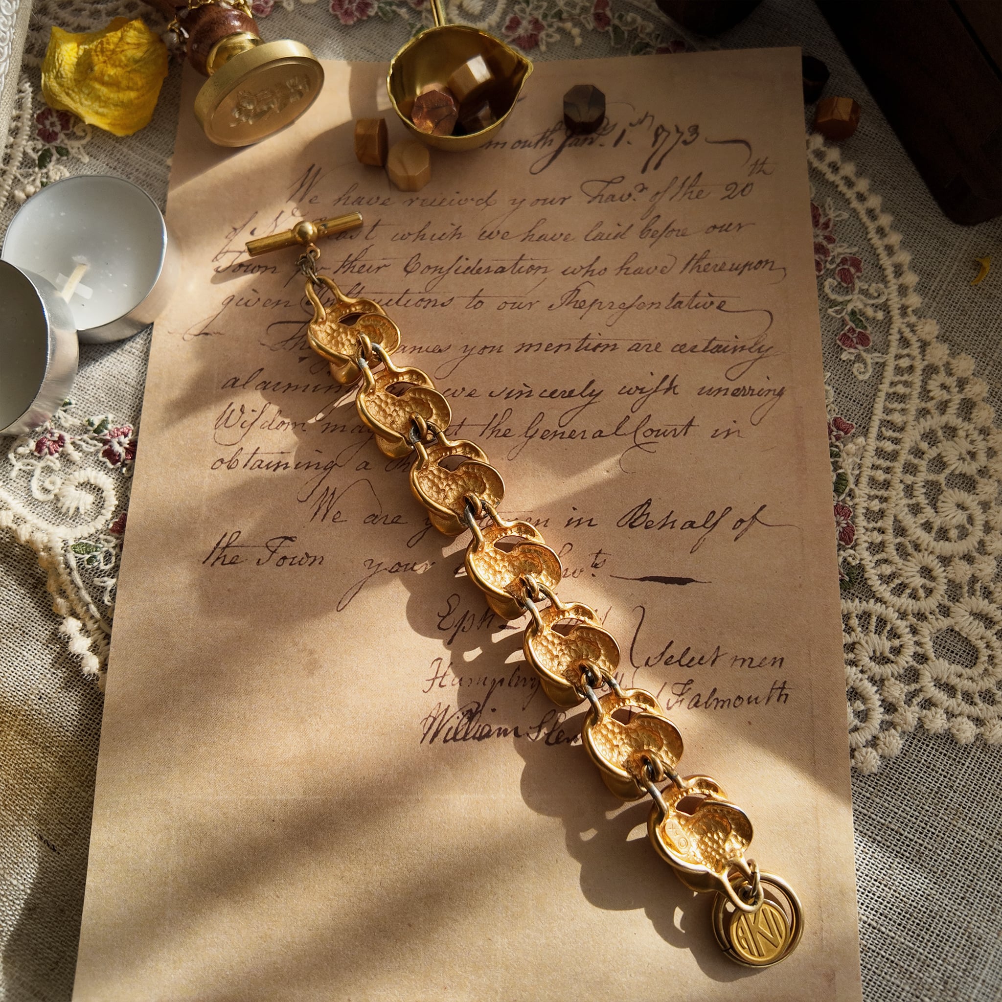 A macro shot honestly showing the significant and visible plate loss at the connection points between the bracelet links, sold as-is for its authentic character.