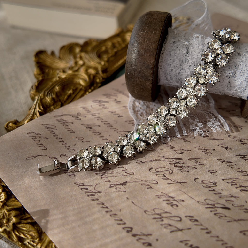 A macro shot detailing the pristine, front-facing condition of the brilliant-cut Austrian crystals and the secure, hand-set prongs on this investment-grade Trifari piece.