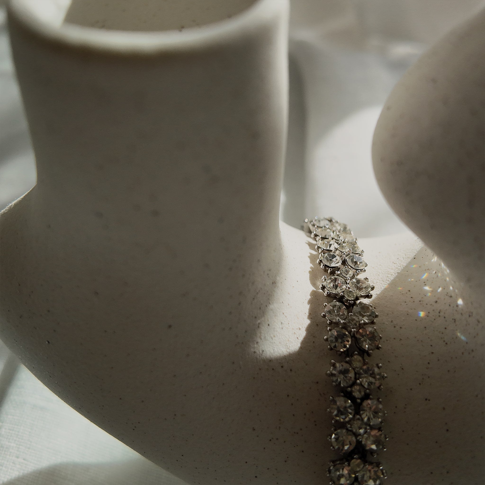 A macro shot detailing the pristine, front-facing condition of the brilliant-cut Austrian crystals and the secure, hand-set prongs on this investment-grade Trifari piece.