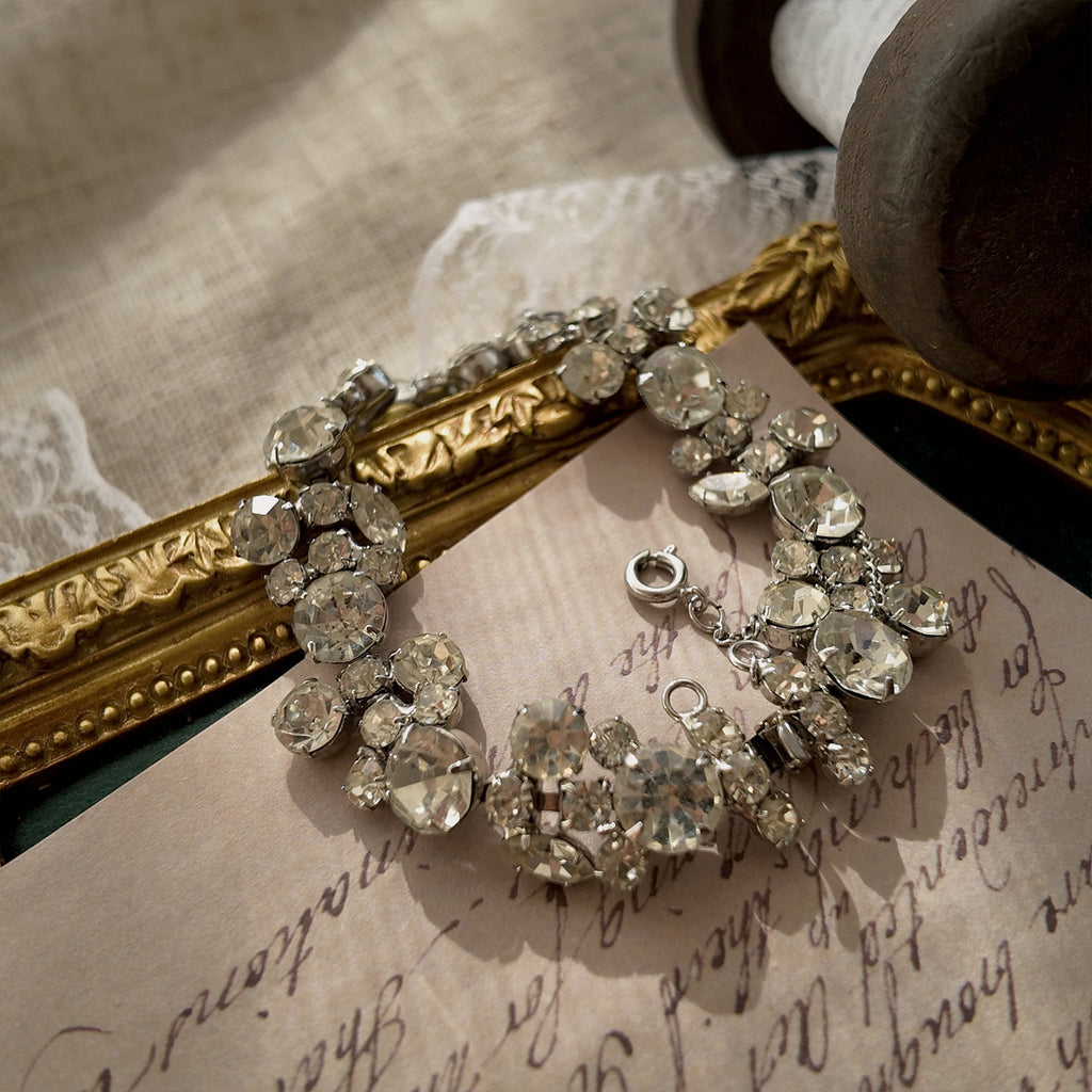 A macro shot detailing the pristine, front-facing condition of the brilliant-cut Austrian crystals, which show no signs of aging from the front.