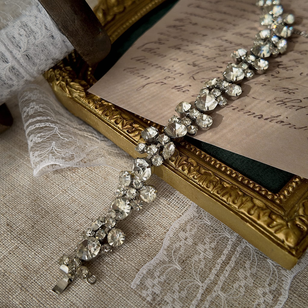 A macro shot detailing the pristine, front-facing condition of the brilliant-cut Austrian crystals, which show no signs of aging from the front.