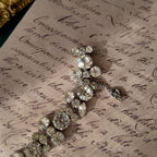 A macro shot detailing the pristine, front-facing condition of the brilliant-cut Austrian crystals, which show no signs of aging from the front.