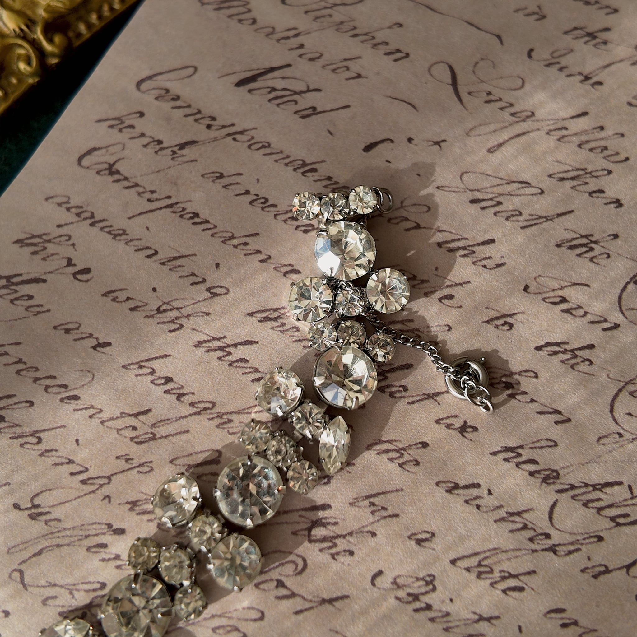 A macro shot detailing the pristine, front-facing condition of the brilliant-cut Austrian crystals, which show no signs of aging from the front.