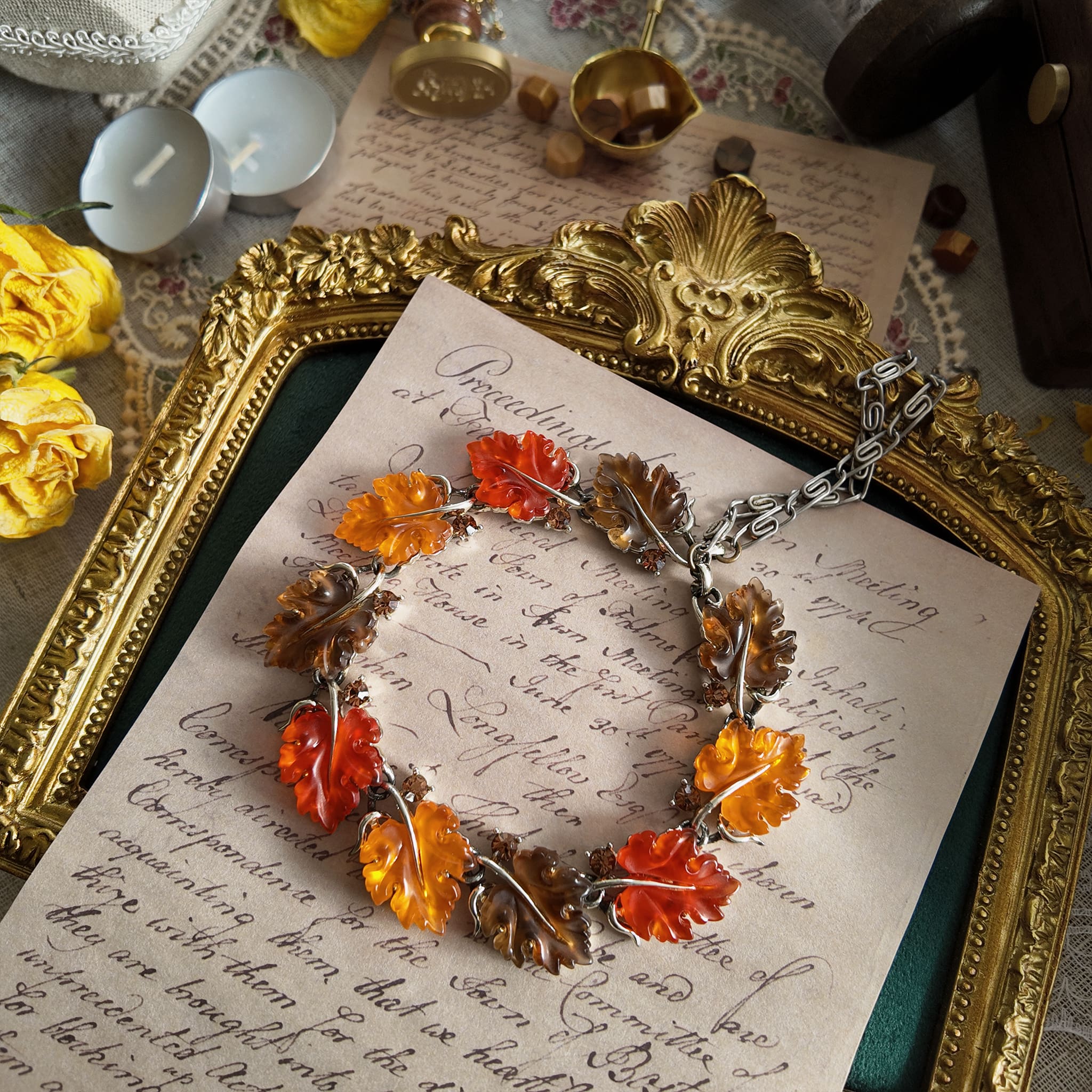 The Lisner Lucite necklace styled with fresh citrus fruits to emphasize its vibrant, joyful color palette and its identity as a piece of wearable sunshine.