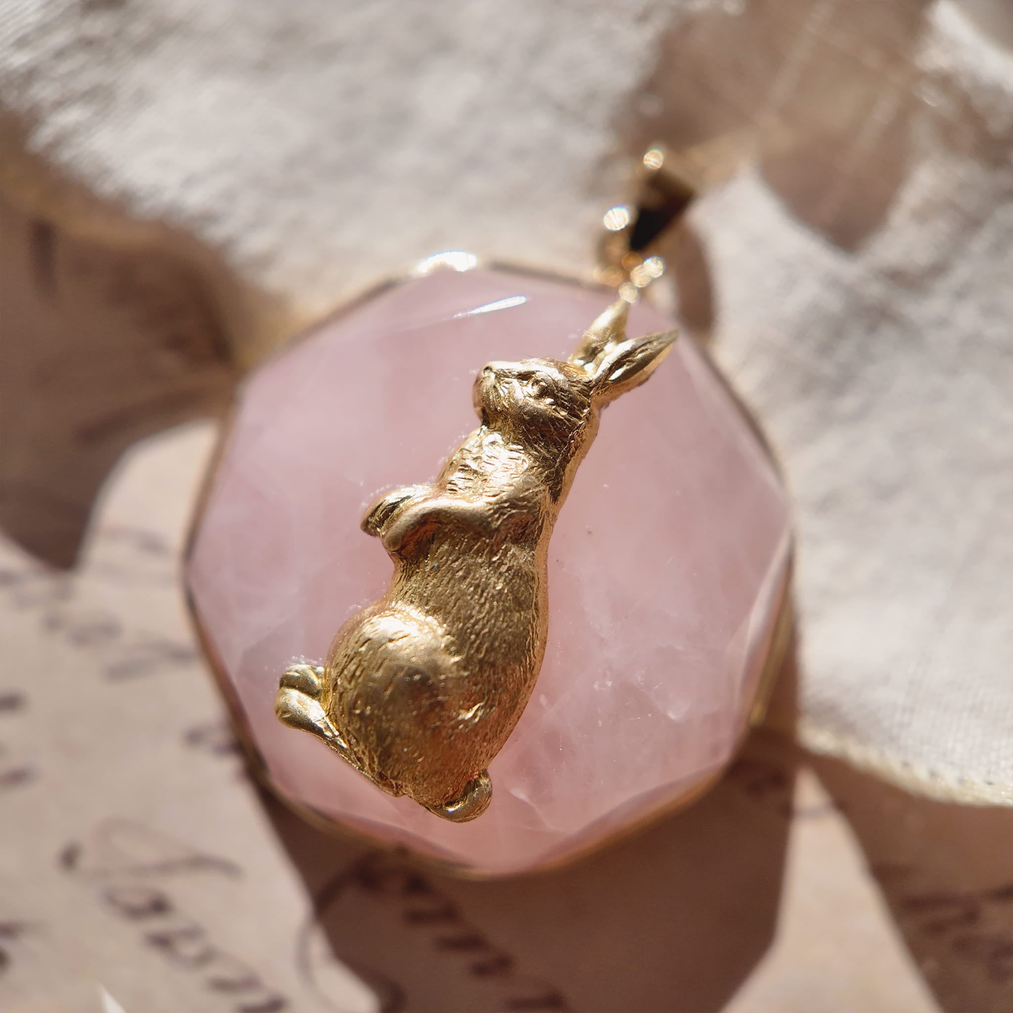 A macro shot detailing the creamy, opaque, marshmallow-like texture of the Natural Pink Aventurine, a key feature of this unique, matte stone.