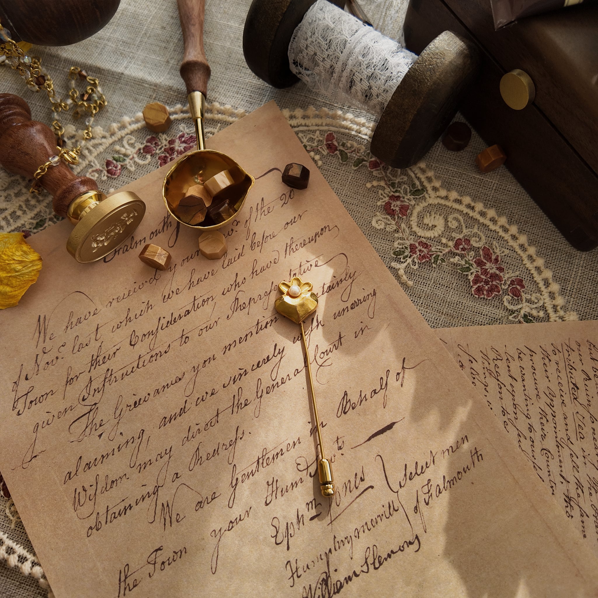 "The Secret Magician," a dainty heart-shaped brooch in a soft, matte gold finish, crowned with a single, lustrous faux pearl. A perfect Light Academia accessory.