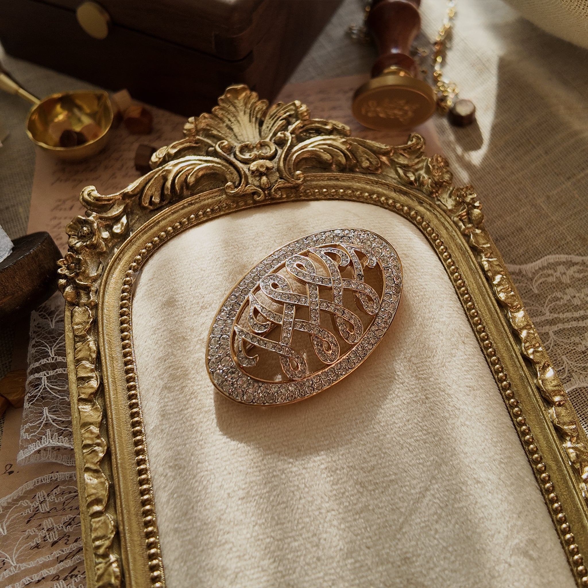 The "Uncrowned Queen," the iconic "WW" monogram brooch from the official Harrods Duchess of Windsor Collection, lavishly paved with brilliant clear crystals.