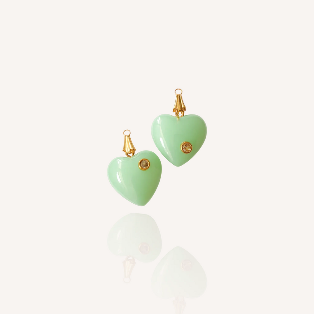 Front view of The Emerald Heart pendant featuring a soft emerald/jade green vintage art glass heart with a sparkling Cubic Zirconia accent.