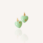 Front view of The Emerald Heart pendant featuring a soft emerald/jade green vintage art glass heart with a sparkling Cubic Zirconia accent.