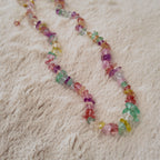 The "Endless Summer" necklace styled next to a melting ice cream cone to emphasize its "Edible Aesthetics" and its identity as a wearable piece of pure sunshine.