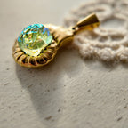 Gold pendant, made of copper plated with real gold.