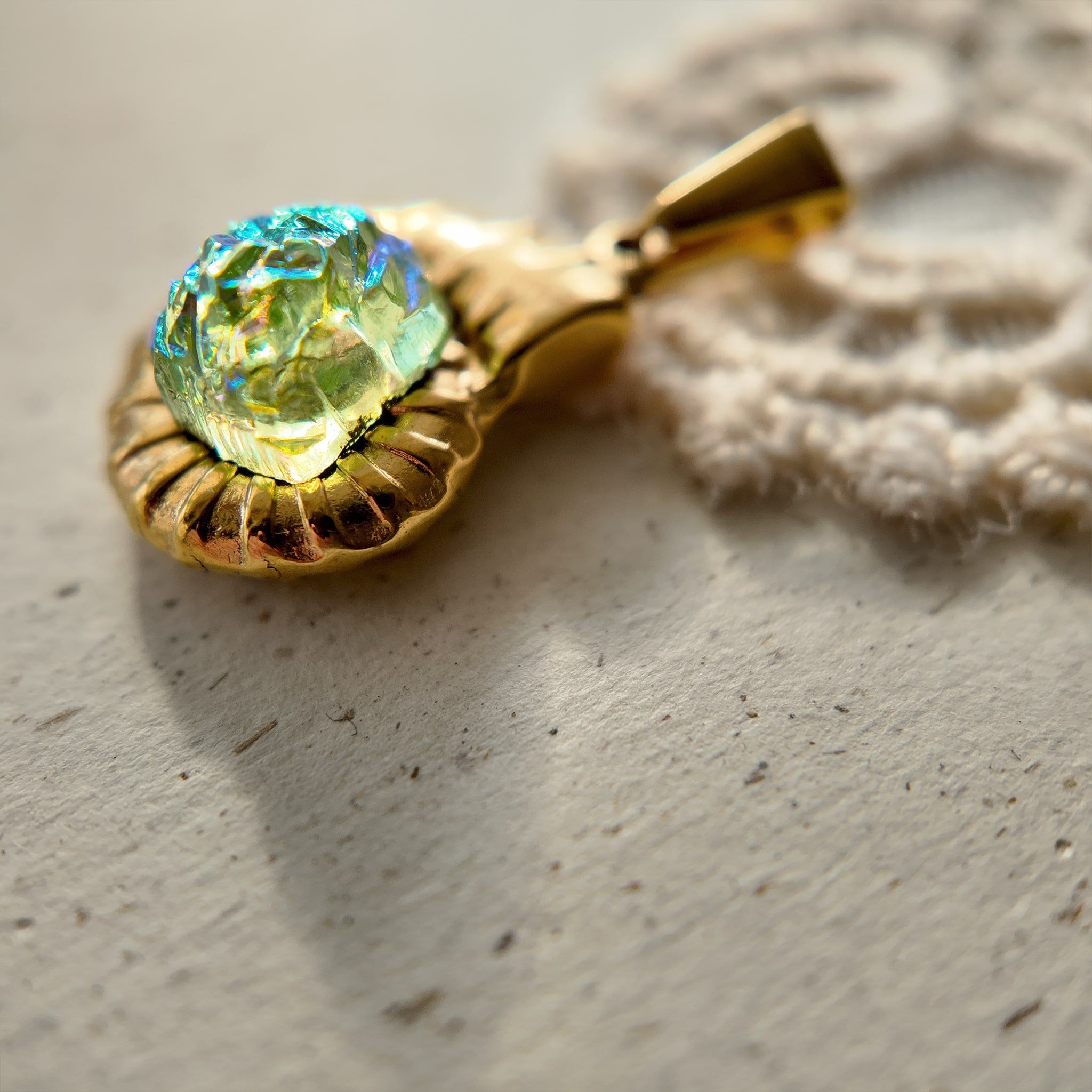 Gold pendant, made of copper plated with real gold.