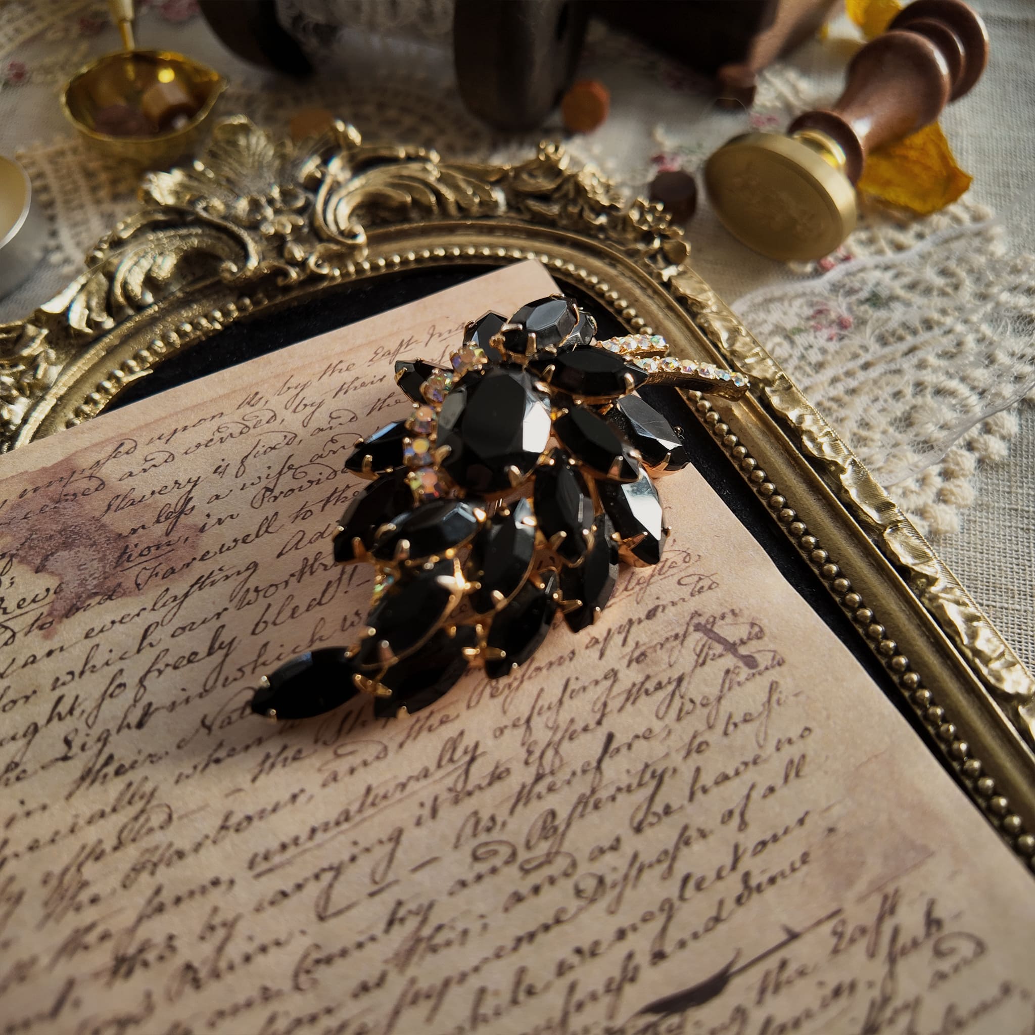 An angled view of the "Prima Ballerina" brooch, highlighting the classic, layered open-back construction typical of high-end DeLizza & Elster jewelry.