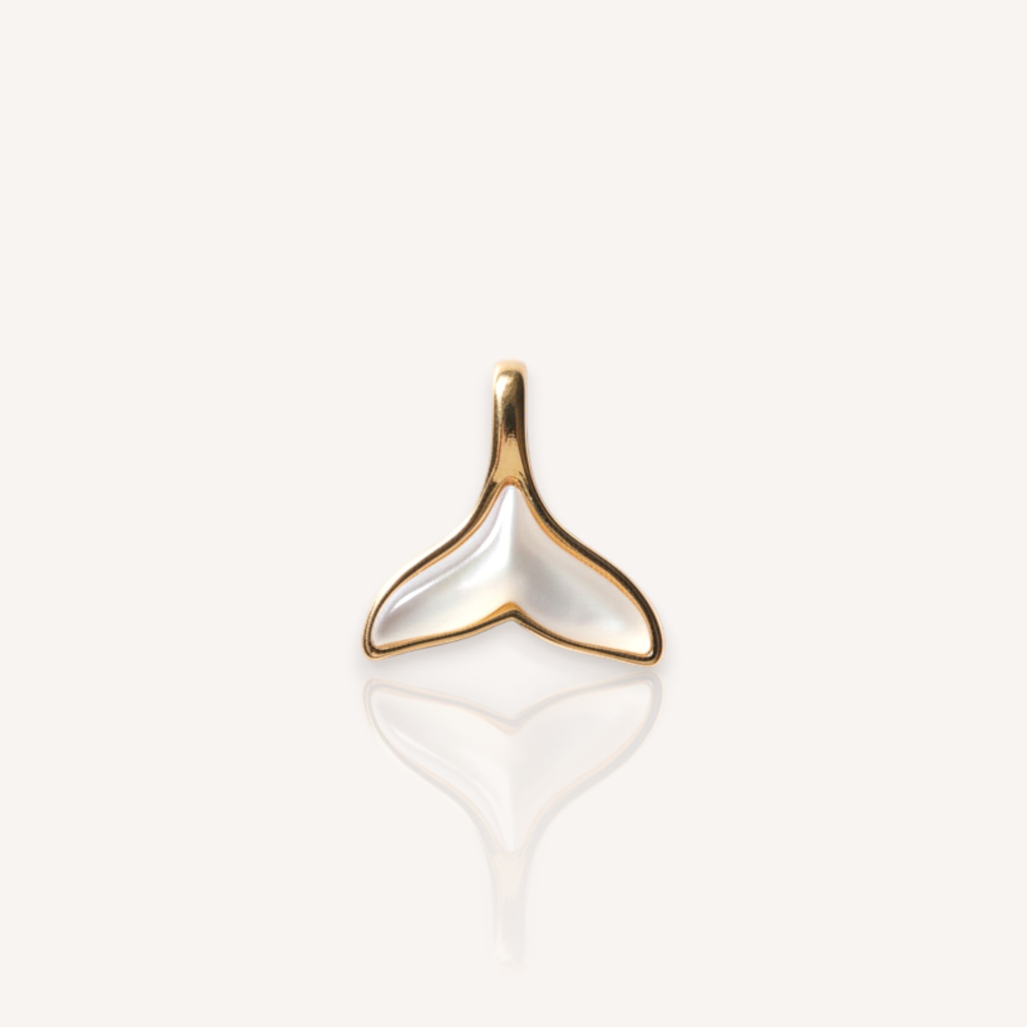 The "Siren's Farewell," a minimalist charm necklace, featuring a mermaid's tail carved from Natural White Mother-of-Pearl in a 14k gold-plated setting.