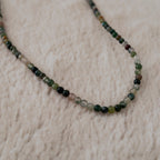 The "Quiet Path" agate choker worn on the neck, showcasing its feather-light feel and its perfect, understated elegance for a Wabi-Sabi or Japandi aesthetic.