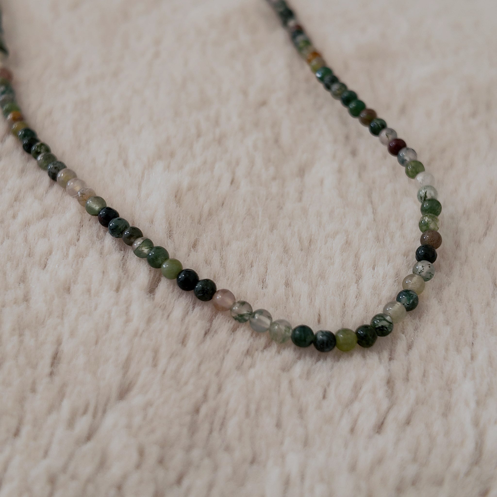 The "Quiet Path" agate choker worn on the neck, showcasing its feather-light feel and its perfect, understated elegance for a Wabi-Sabi or Japandi aesthetic.