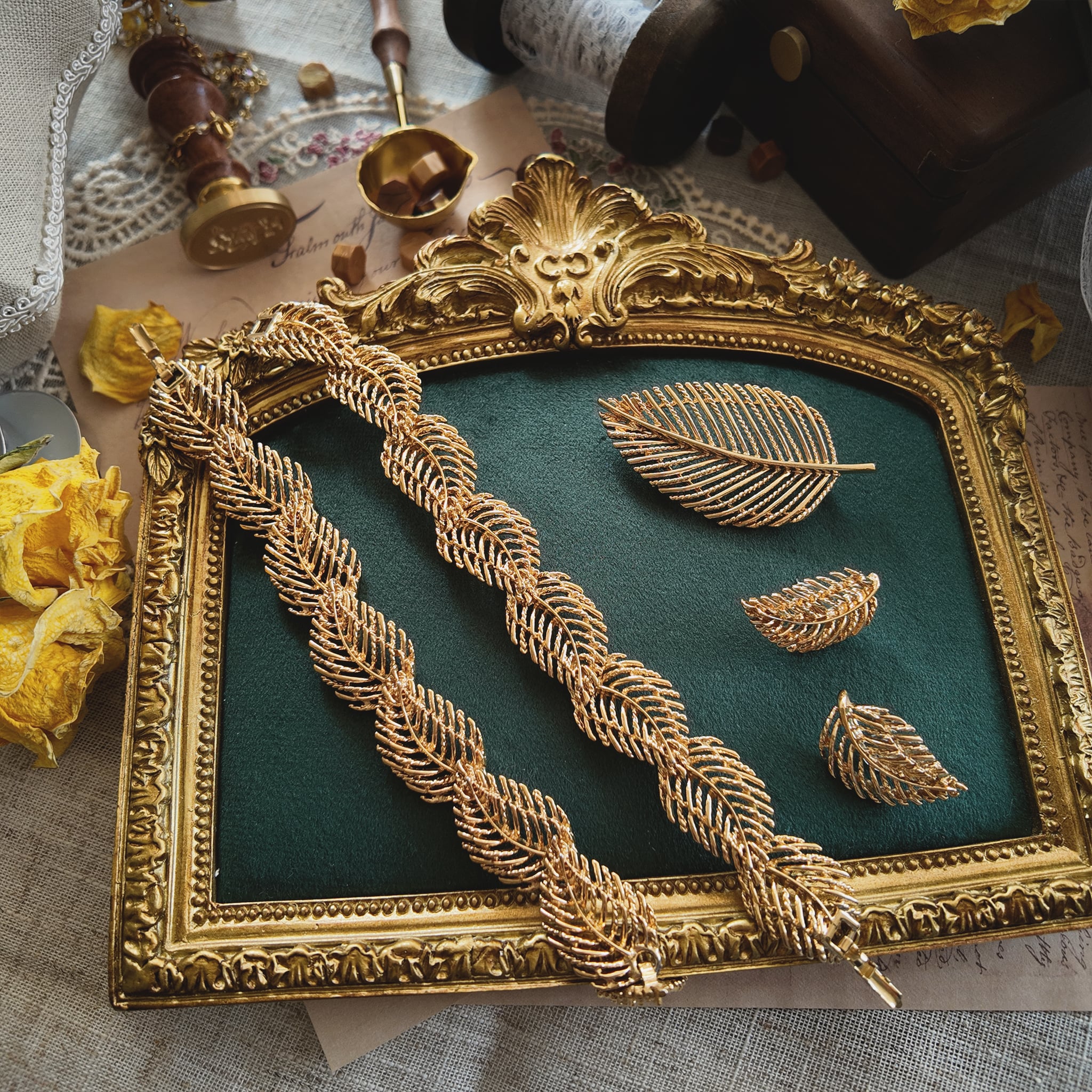 The complete "Secret of the Golden Leaf" vintage Napier parure, including the convertible necklace, the matching statement brooch, and the elegant leaf earrings.