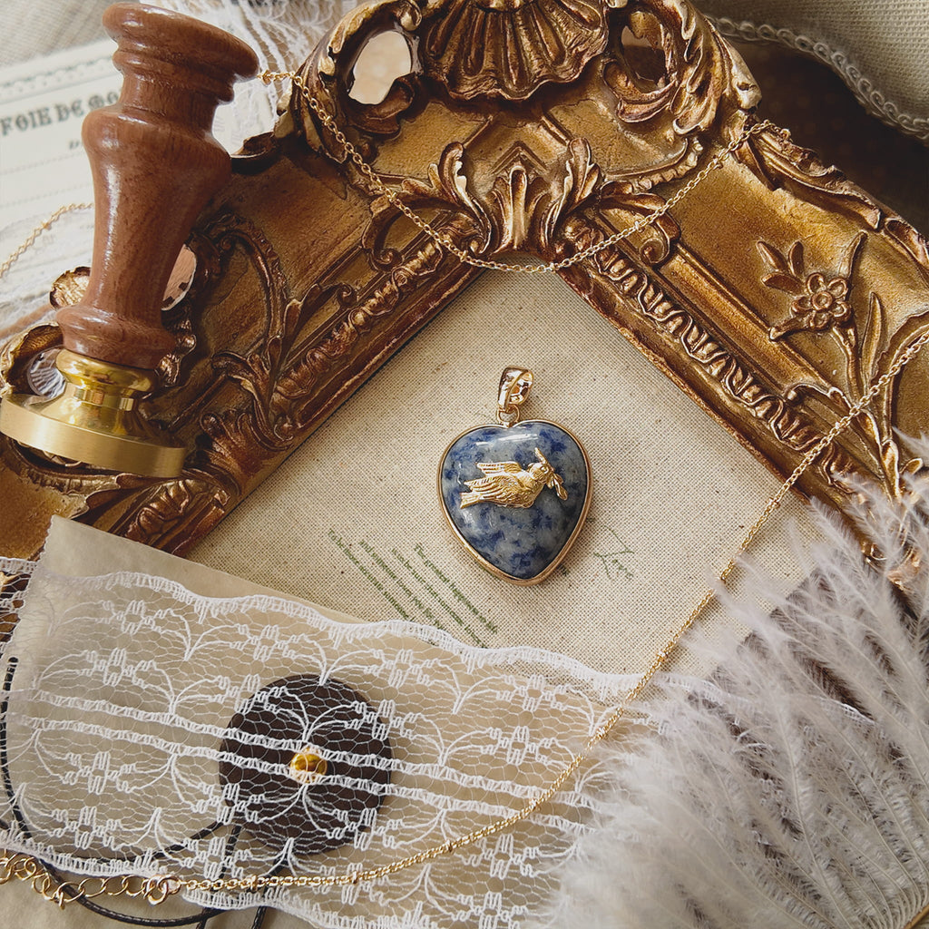 Atmospheric flatlay photography of the vintage component necklace styled with natural, quiet aesthetic elements.
