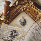 Atmospheric flatlay photography of the vintage component necklace styled with natural, quiet aesthetic elements.