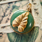 A macro shot detailing the natural, mossy green inclusions within the semi-translucent Green Aventurine, a key feature of this crystal healing stone.