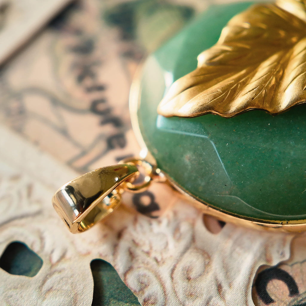 A macro shot detailing the natural, mossy green inclusions within the semi-translucent Green Aventurine, a key feature of this **beautiful spiritual stone**.