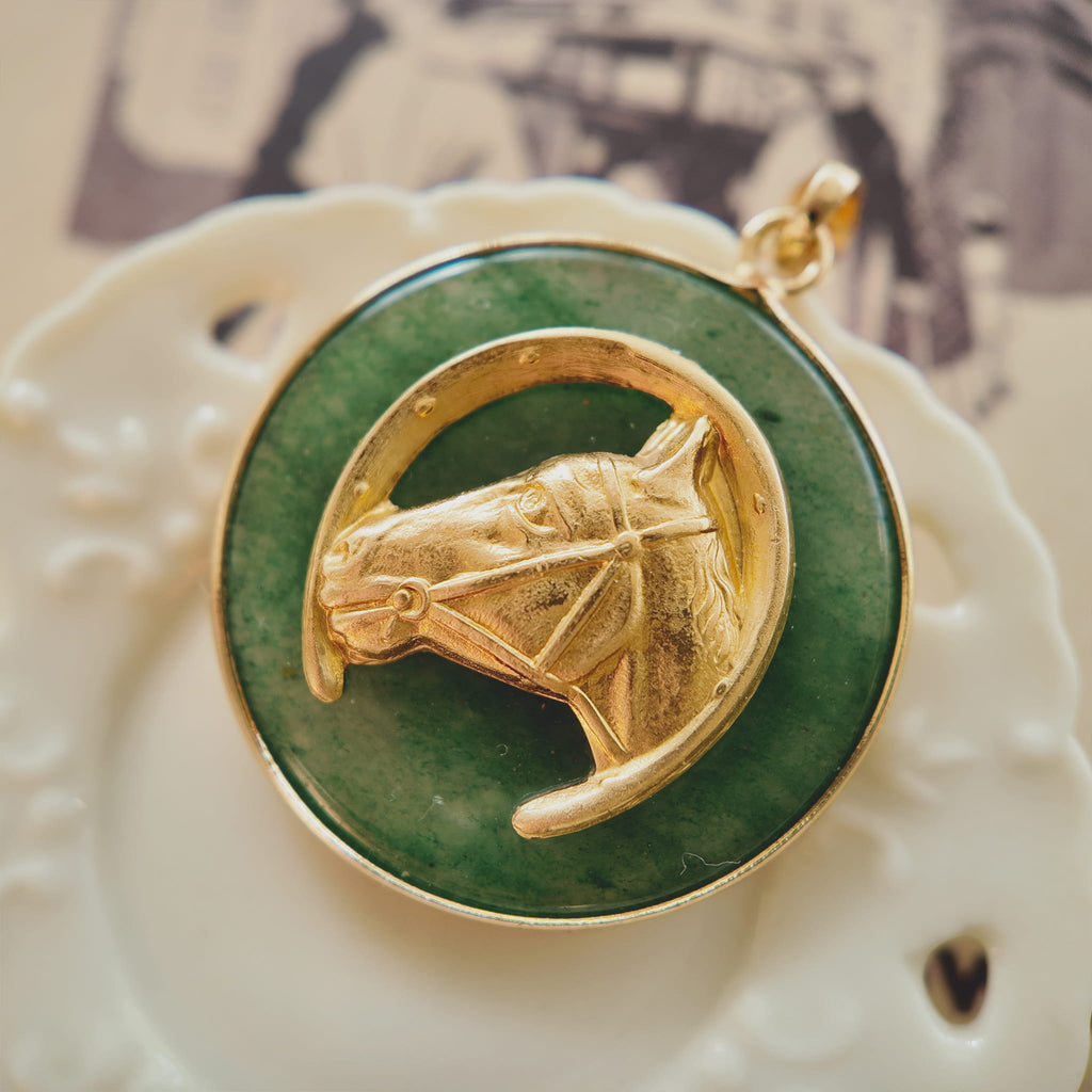 A macro shot detailing the smooth, polished surface and the deep, lush green hue of the Natural Green Jade/Aventurine, a stone known as a symbol of good luck.