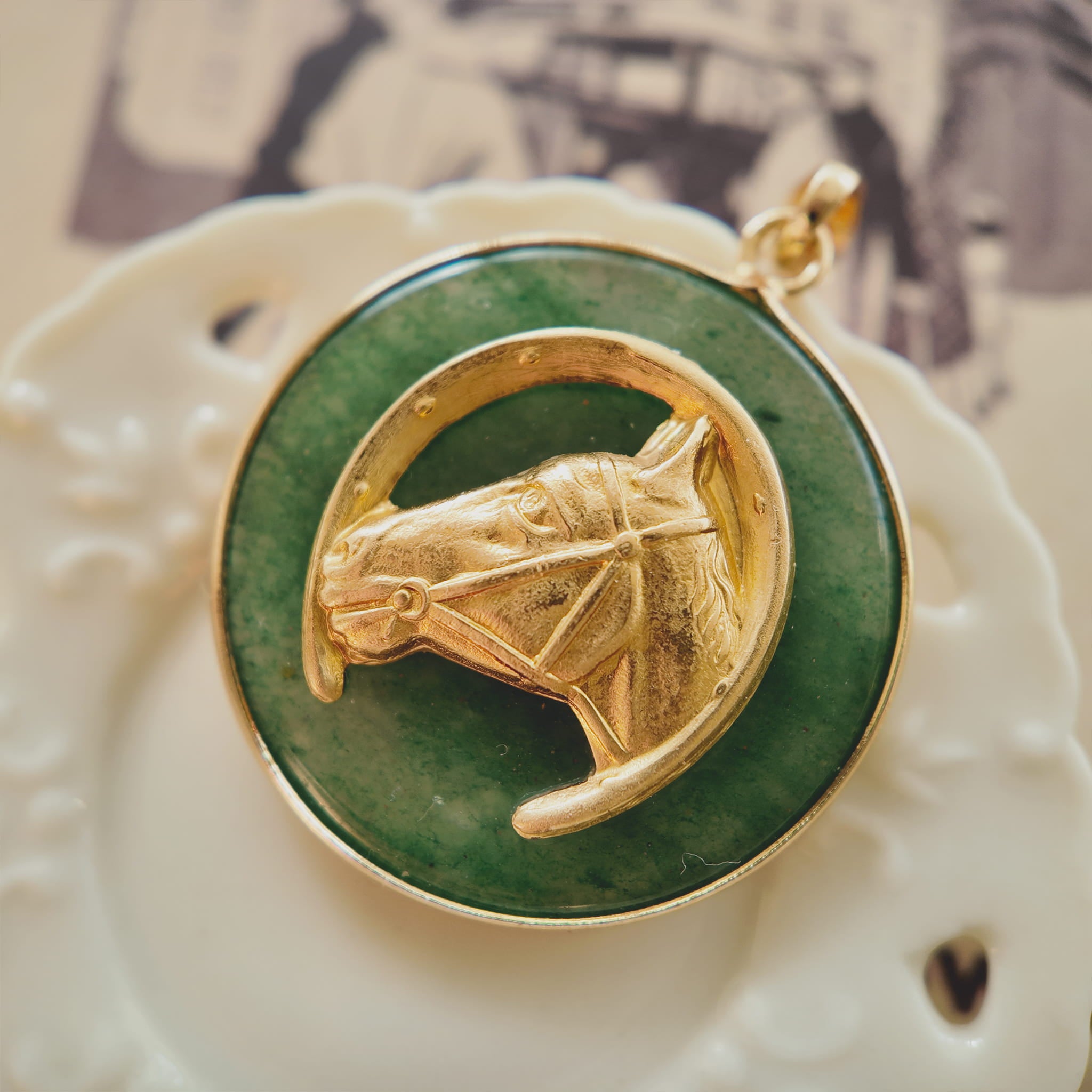 A macro shot detailing the smooth, polished surface and the deep, lush green hue of the Natural Green Jade/Aventurine, a stone known as a symbol of good luck.