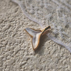 A macro shot detailing the natural, satin-like sheen and the subtle, iridescent colors within the Natural White Mother-of-Pearl.