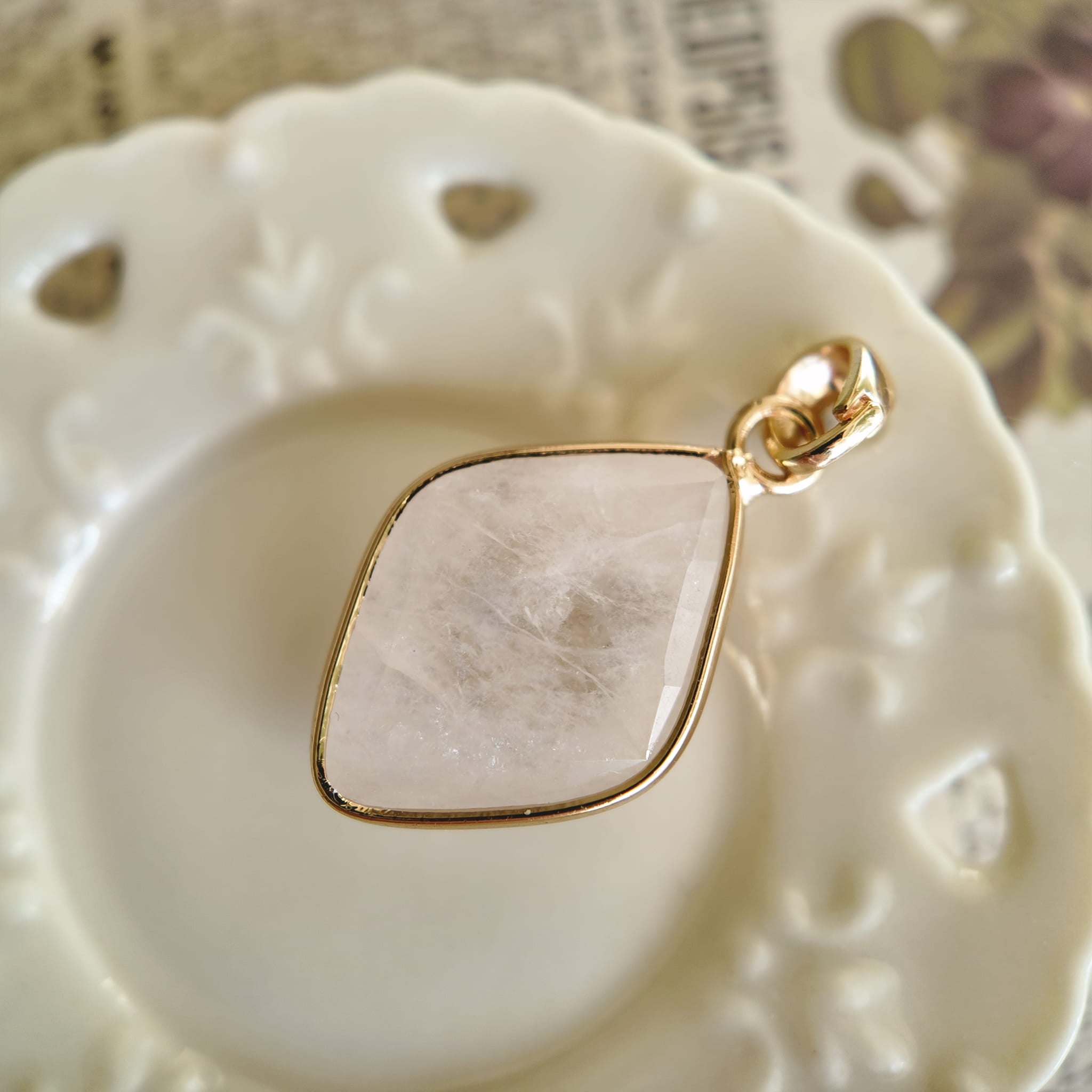 Texture detail of natural white quartz rhombus showing its semi-translucence and unique icy inclusions.