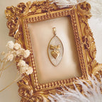 Dreamy flatlay photography of the vintage component necklace, styled to evoke ocean magic and soft, ethereal beauty.