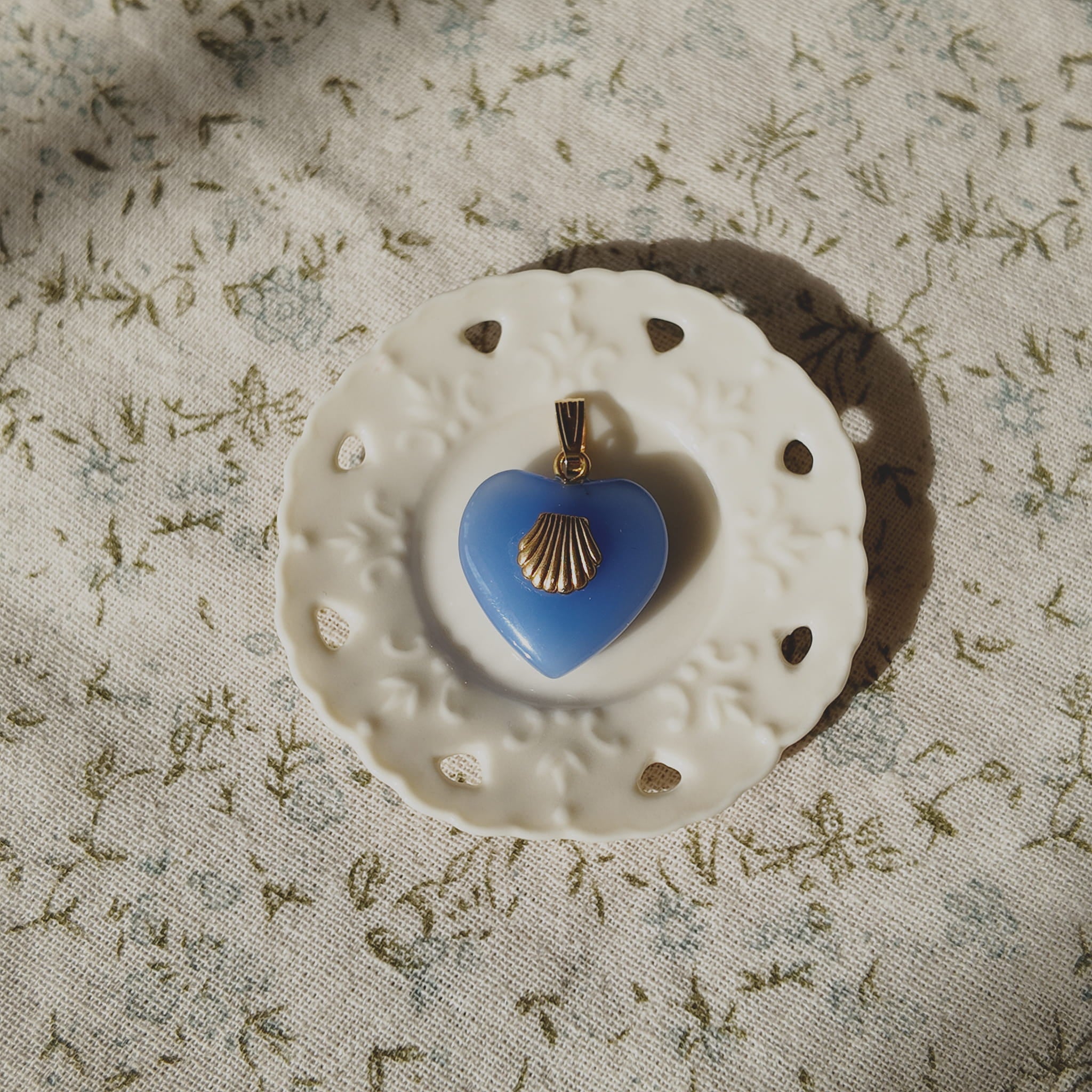 Atmospheric flatlay photography of the vintage component necklace, styled to evoke ocean soul, coastal serenity, and a sense of adventure.
