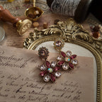 A macro shot detailing the exceptional quality of the Austrian crystals and the magical, fiery flash of the tiny faux opal stones used in this Monet design.