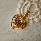 The reverse side of "The Sunset Vortex" pendant, showing the clean construction and craftsmanship of this piece of artisan-reimagined vintage jewelry.