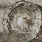 The Sun-Soaked Survivor pendant next to a ruler, illustrating its 0.9 inches petite heart length.