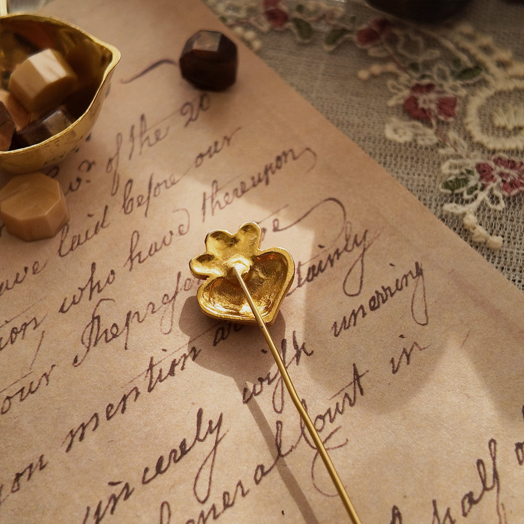 The reverse side of "The Secret Magician" brooch, showing the clean construction and the secure, fully functional pin mechanism of this brand-new piece.