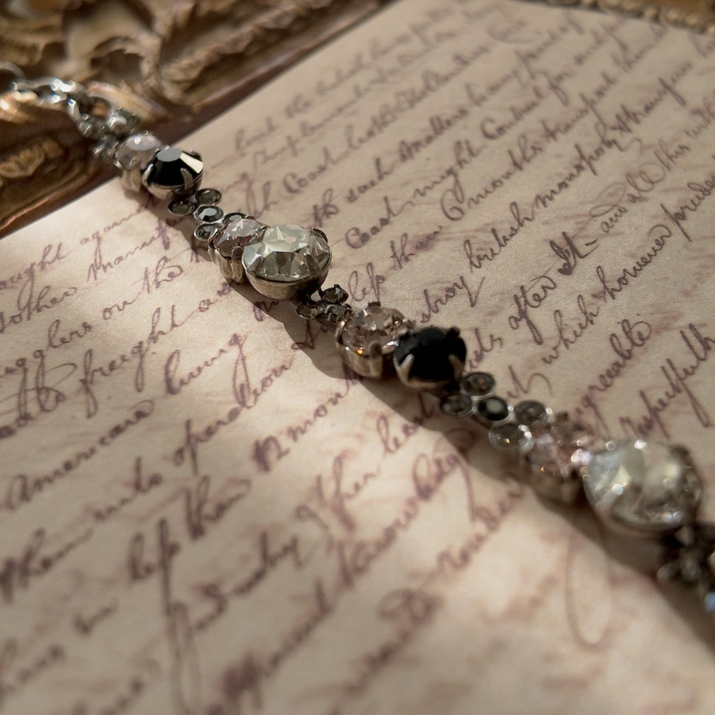 An angled view of the "Rebel Poetess" Gothic Lolita bracelet, highlighting the intricate, multi-stone links and the quality of Sorrelli's craftsmanship.