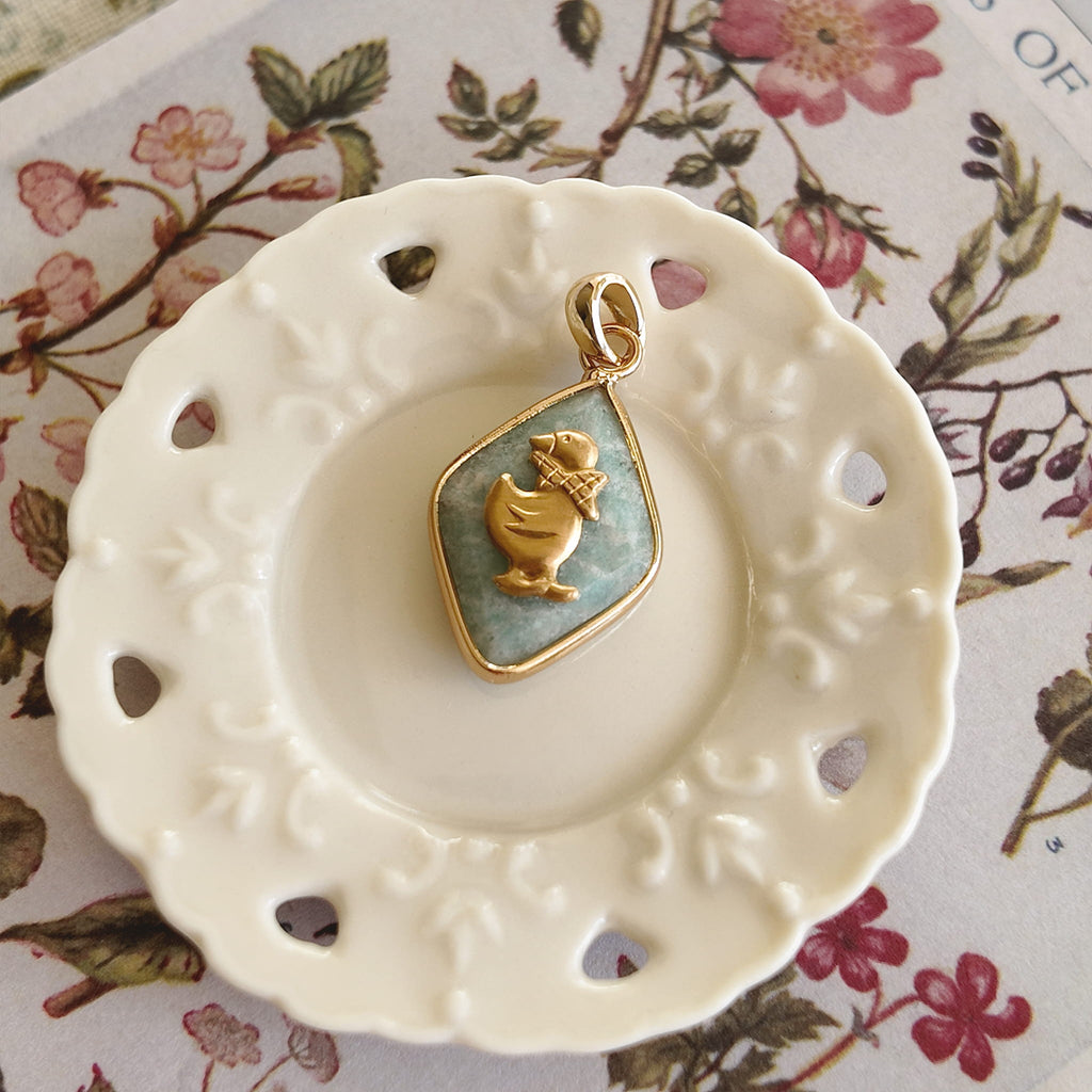 Playful flatlay photography of the vintage component necklace, styled to evoke a storybook character and whimsical mood.