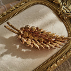 The reverse side of the unsigned Juliana brooch, showing the characteristic open-back settings and puddling solder that confirm its DeLizza & Elster origin.