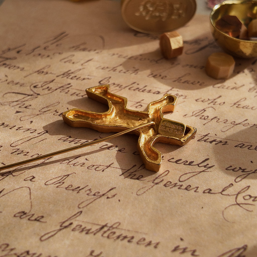 A close-up of the authentic "VAN WYK" signature stamped on the reverse of the rare 1960s modernist figural brooch.