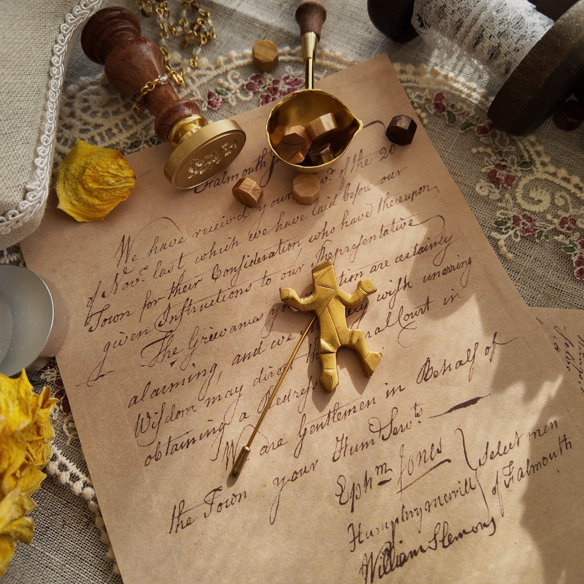 The "Golden Reminder to Smile," a rare vintage modernist brooch by Van Wyk, featuring a minimalist, abstract figural design in a soft matte gold finish.