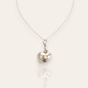 The "Vow," a vintage promise necklace in 925 sterling silver, featuring a split heart pendant engraved with "Eternal Love" and set with a pearl and rhinestones.