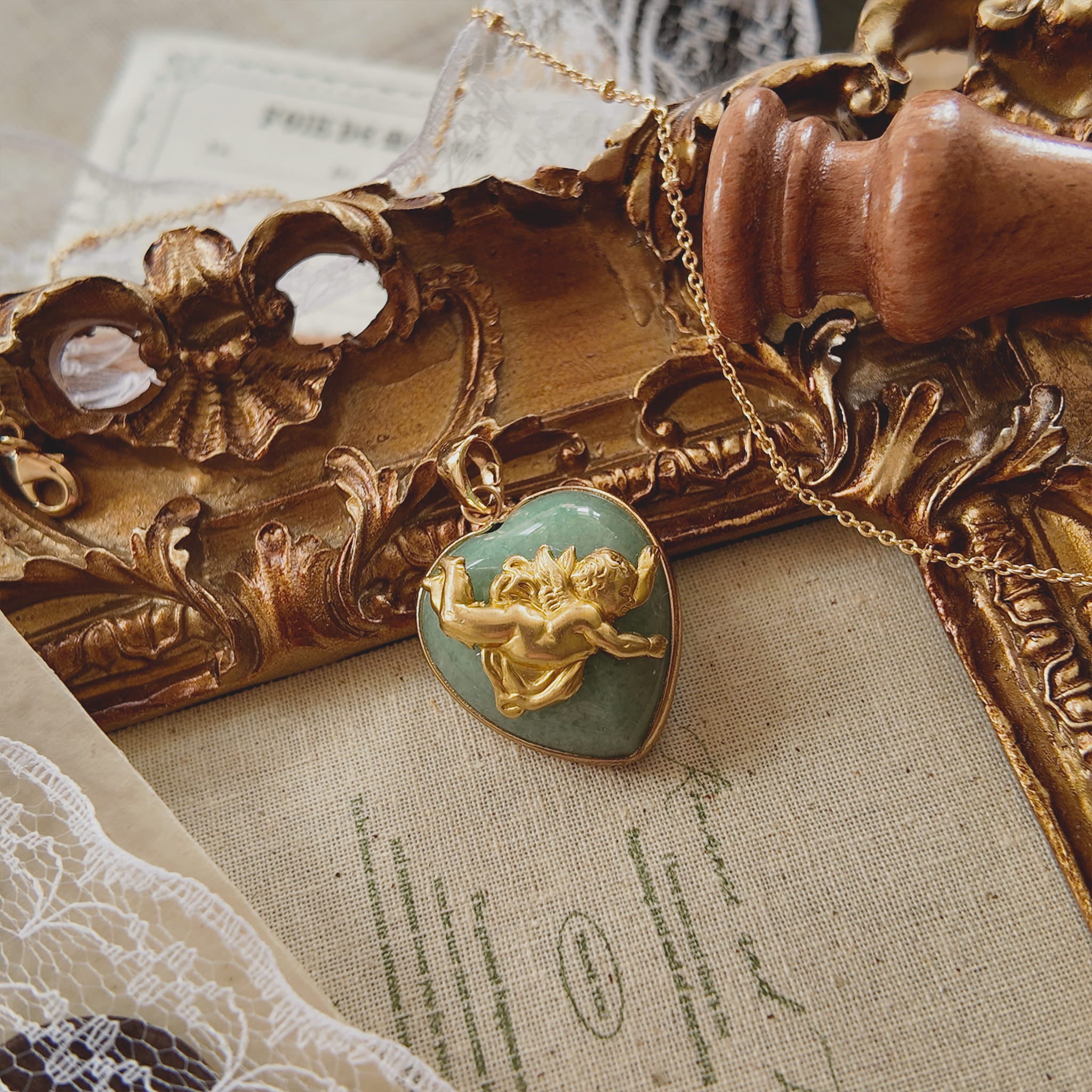 The Dreamer's Descent pendant next to a ruler showing 1.14 inches length size.