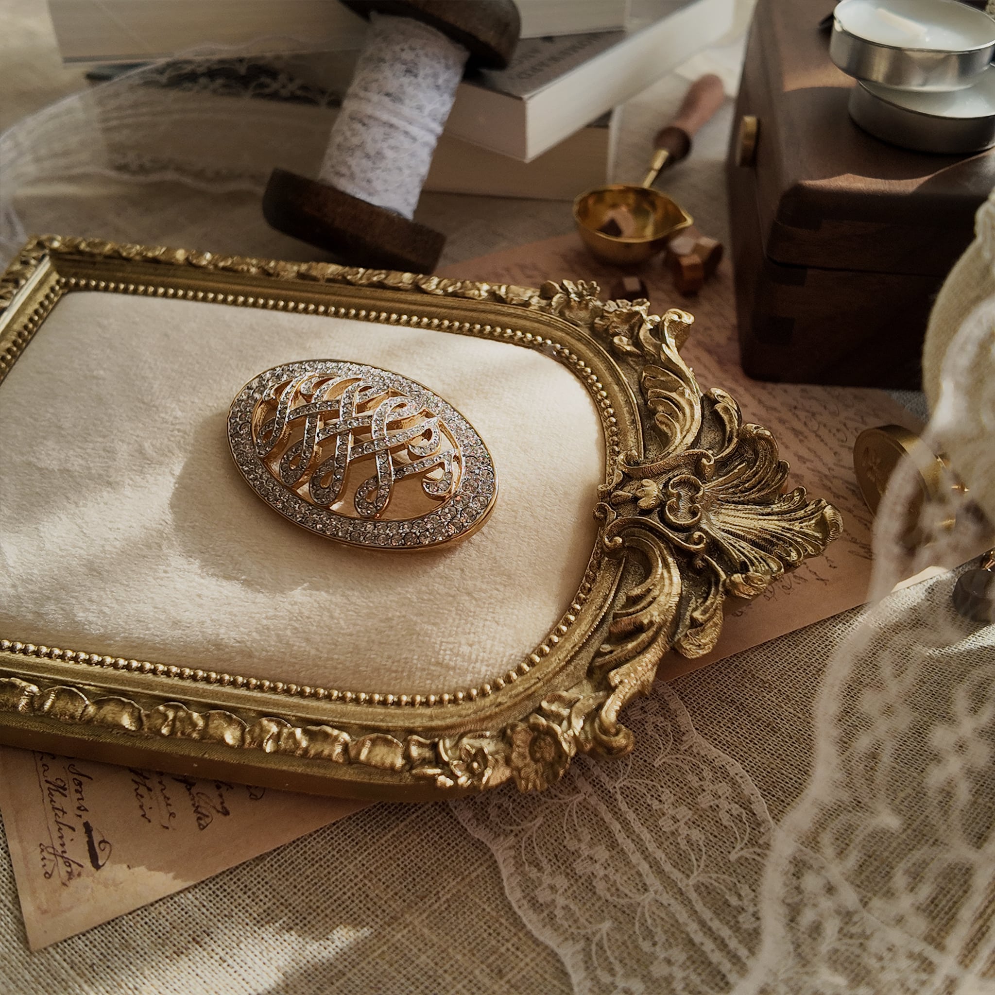 The "WW" brooch styled next to a photo of Wallis Simpson to emphasize its historical significance as a symbol of the 20th century's greatest royal love story.