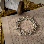 The "Whisper of Sparkle," a dainty vintage tennis bracelet by Weiss, featuring a single, flowing line of brilliant, clear Austrian crystal rhinestones.